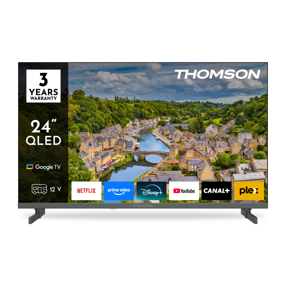 Thomson QLED TV displaying a scenic village on the screen with brand logos and features.