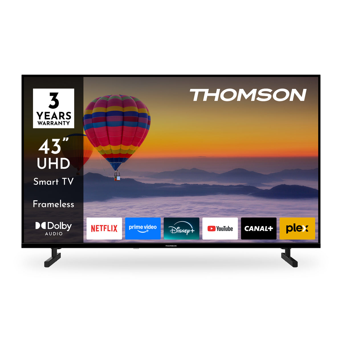 Thomson smart TV with a hot air balloon and mountain landscape on the screen, featuring multiple streaming app logos.