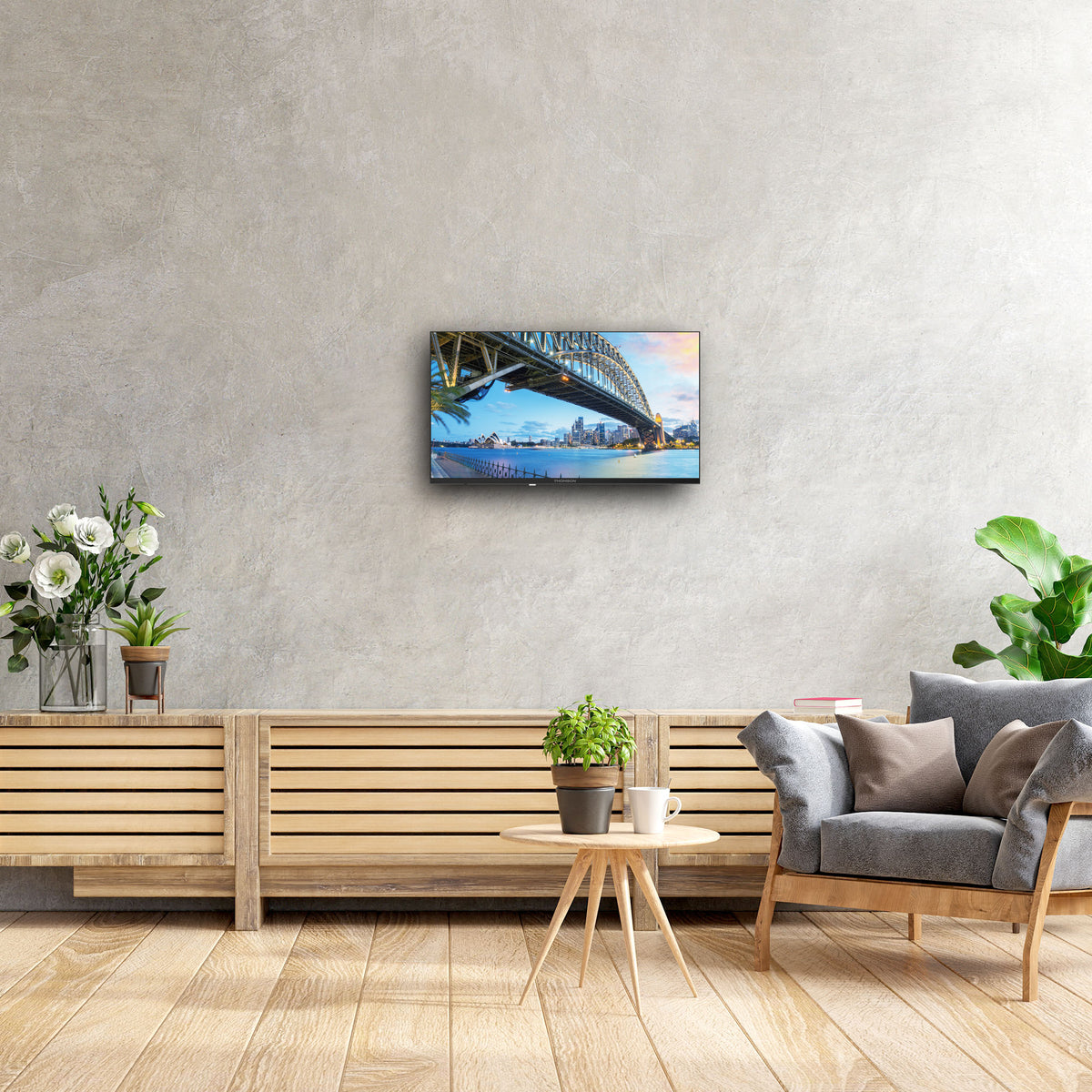 Living room with a TV displaying a bridge, wooden bench, and decorative items.