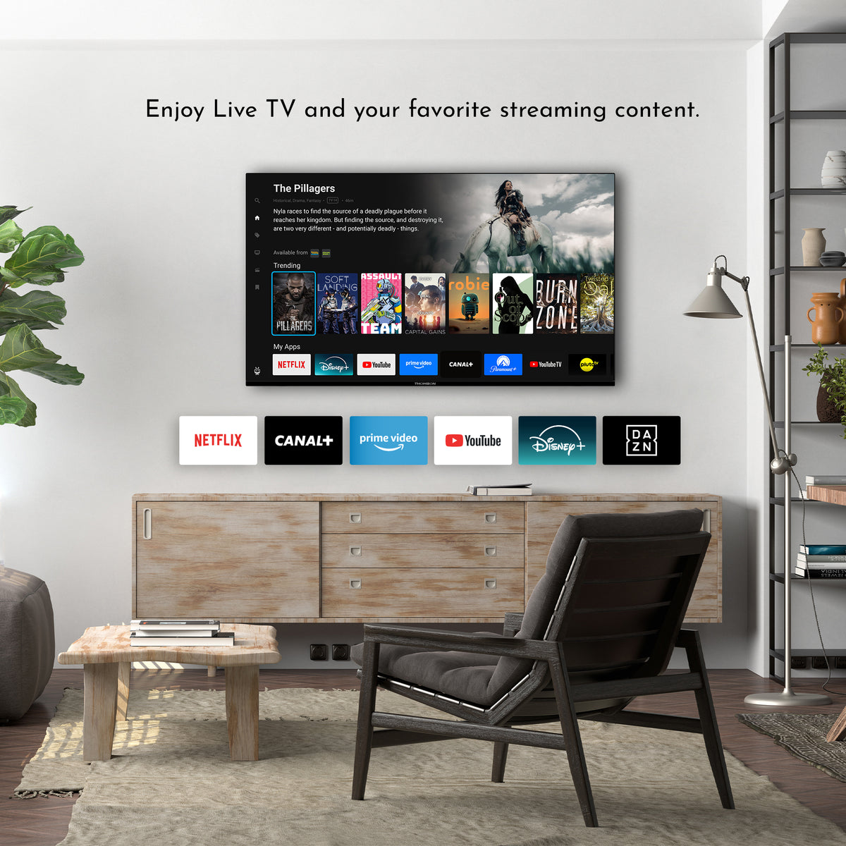 Living room with a TV displaying streaming services and a comfortable chair.