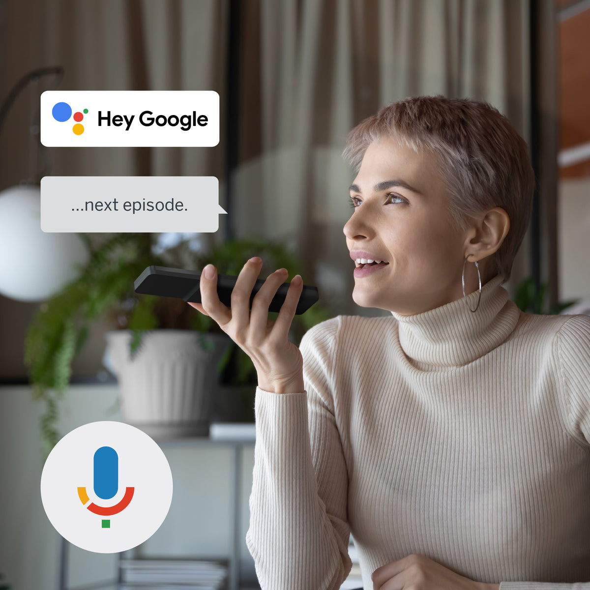 Woman using a remote control with Hey Google feature in a home setting